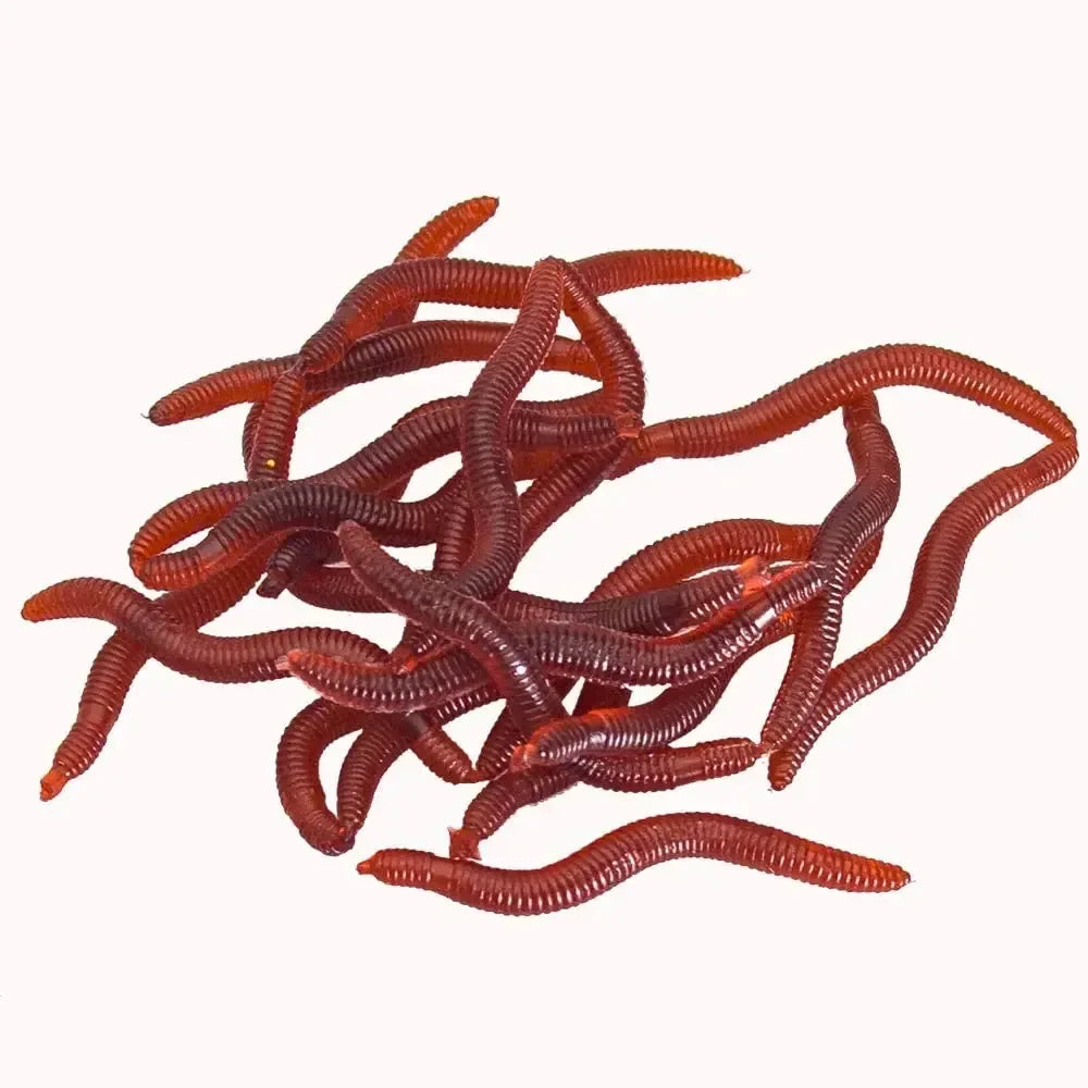 Pile of realistic brown plastic fishing worms for camping and hiking gear Hacksoutdoors
