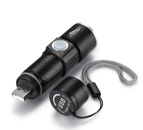 Rechargeable black LED flashlight with USB port and wrist strap for camping and outdoor gear