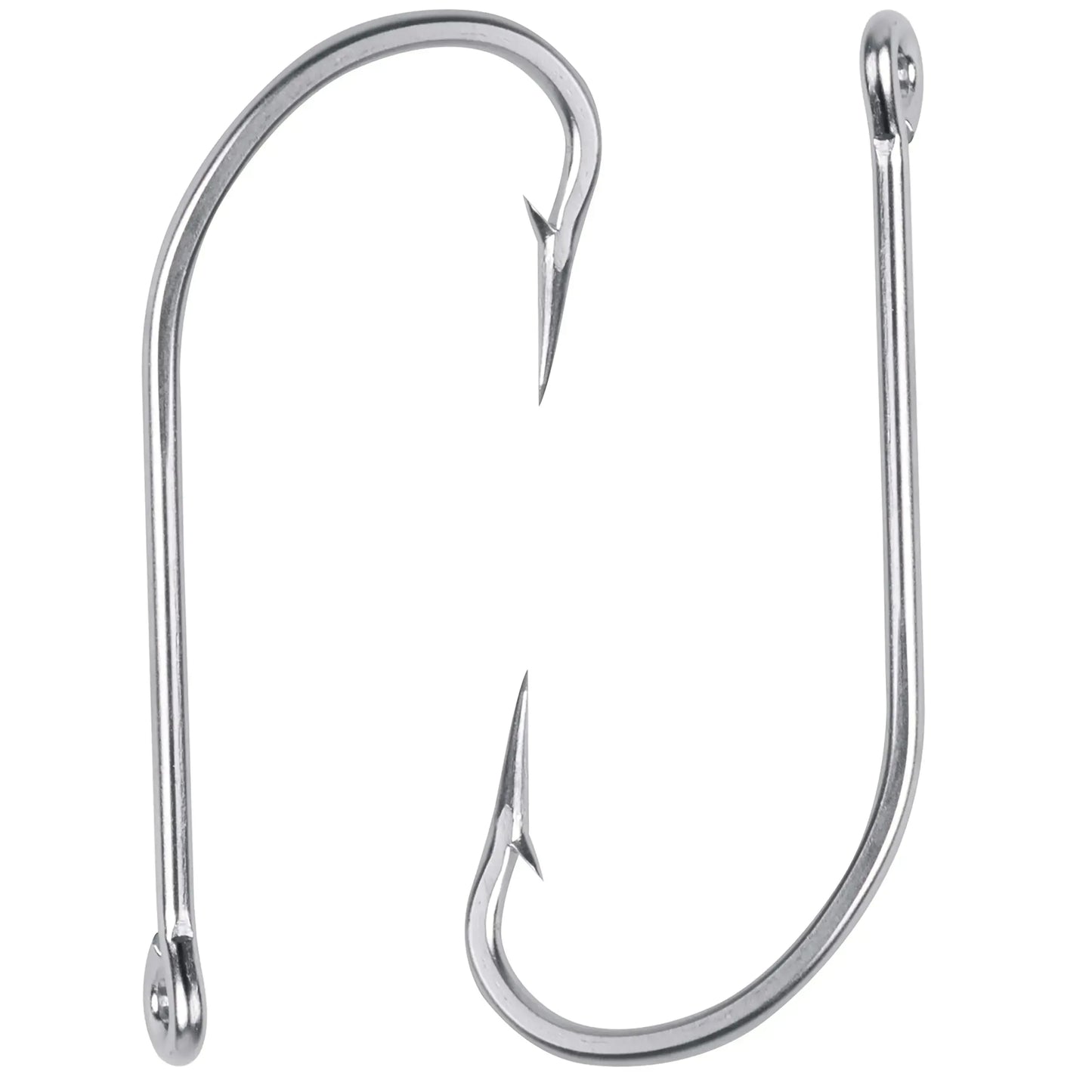 Close-up of two shiny metal fishing hooks for camping and outdoor gear